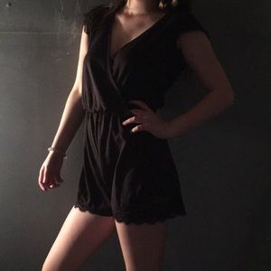 Black romper with lace detailing